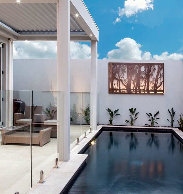 Outdoor living By the pool with Entanglements laser cut metal art