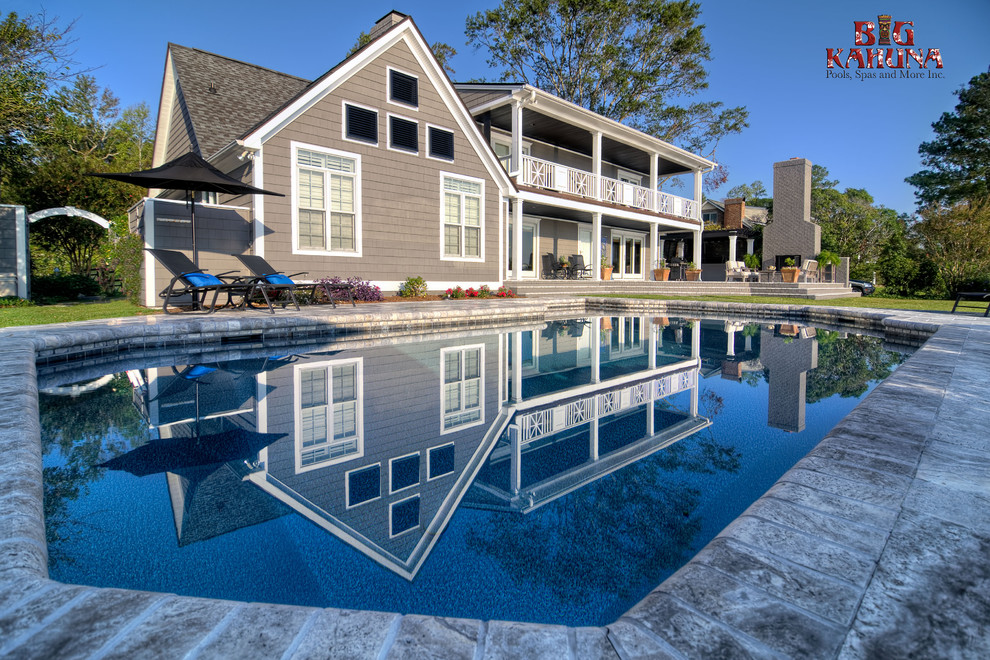 Design ideas for a contemporary swimming pool in Raleigh.