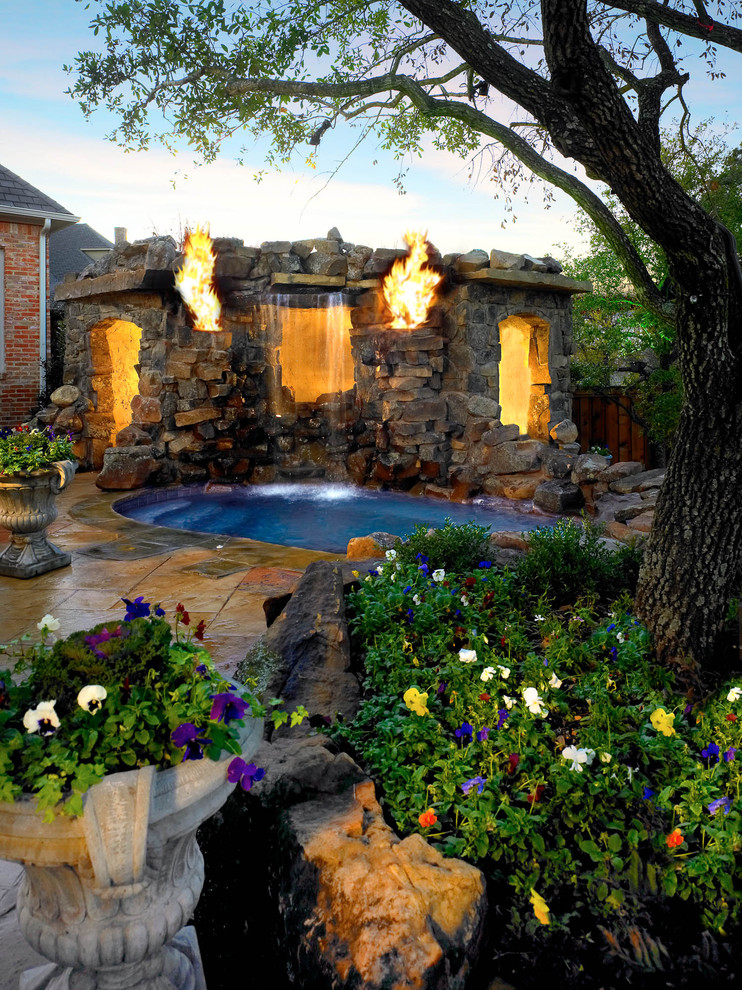 Inspiration for a tropical round pool remodel in Dallas