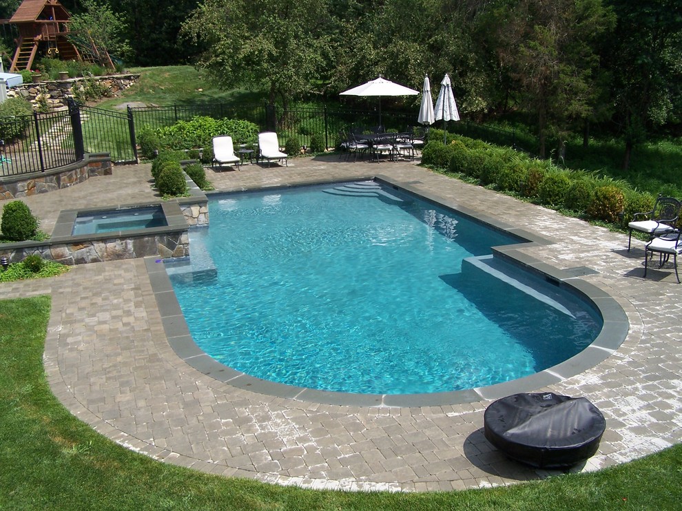 Outdoor Living with a Custom Pool & Spa Modern Pool New York by All American Custom