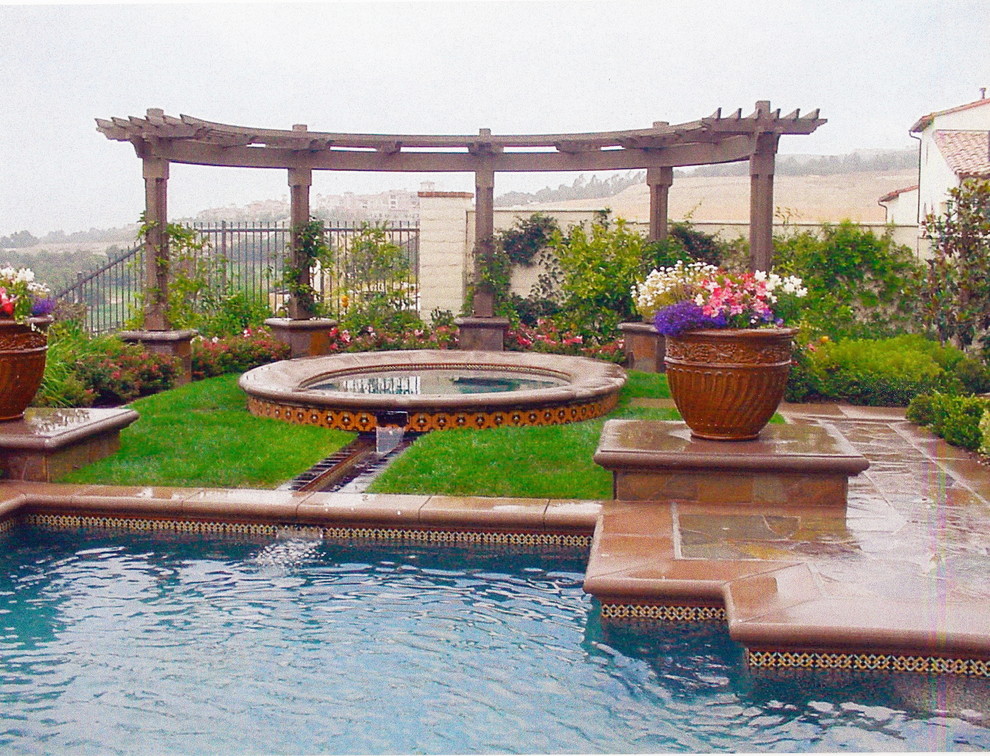 This is an example of a mediterranean swimming pool in Orange County.