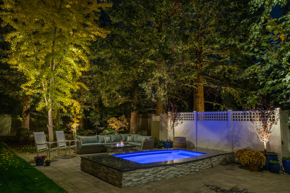 Pool - traditional stone and rectangular lap pool idea in Providence