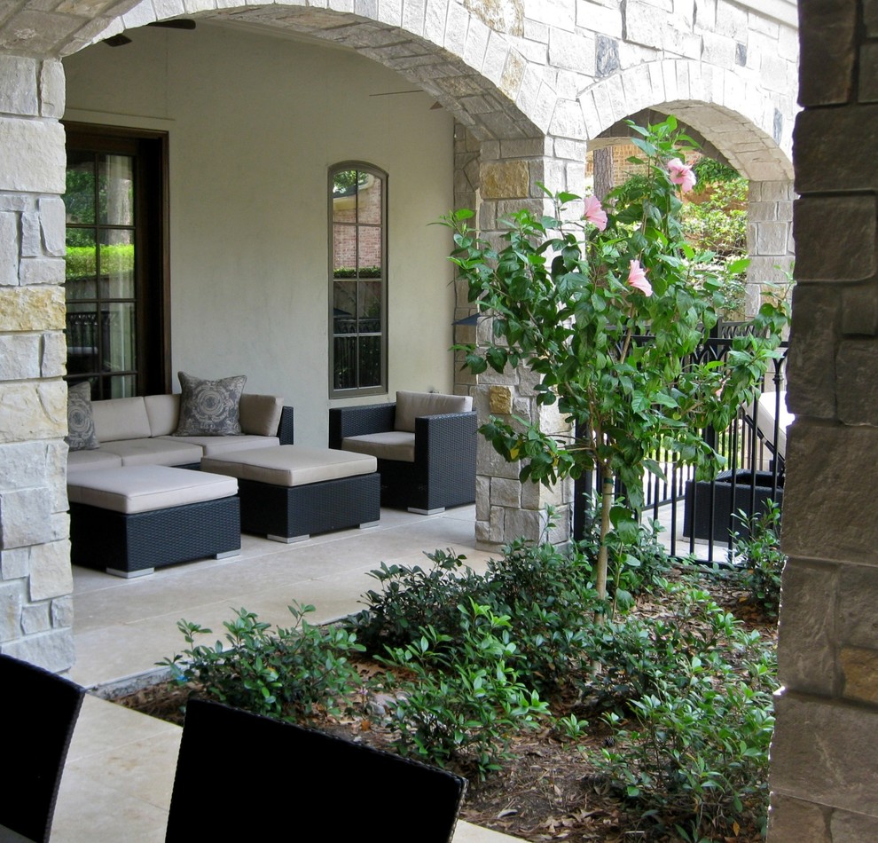 Inspiration for a timeless backyard rectangular natural pool remodel in Houston