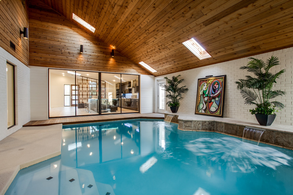 Inspiration for a contemporary indoor custom shaped swimming pool in Dallas.