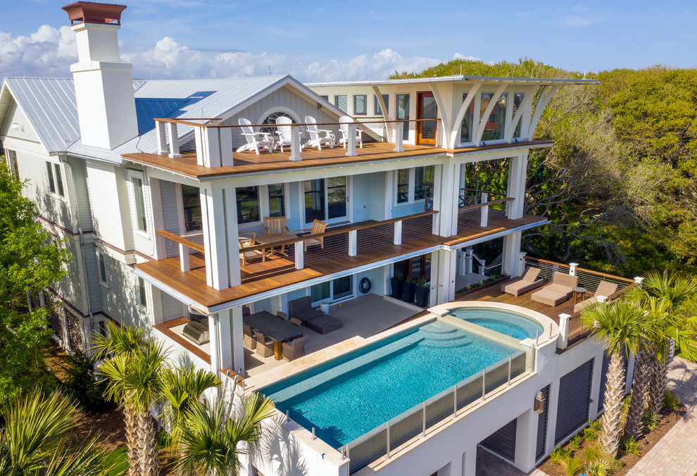 Inspiration for a modern aboveground pool remodel in Charleston with decking