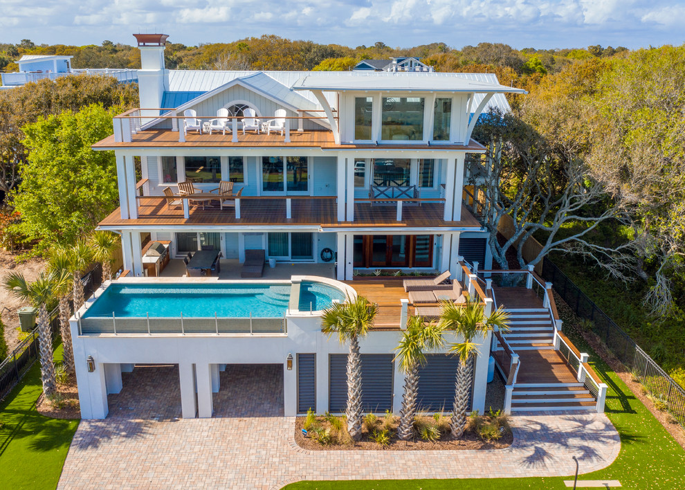 Pool - modern aboveground pool idea in Charleston with decking
