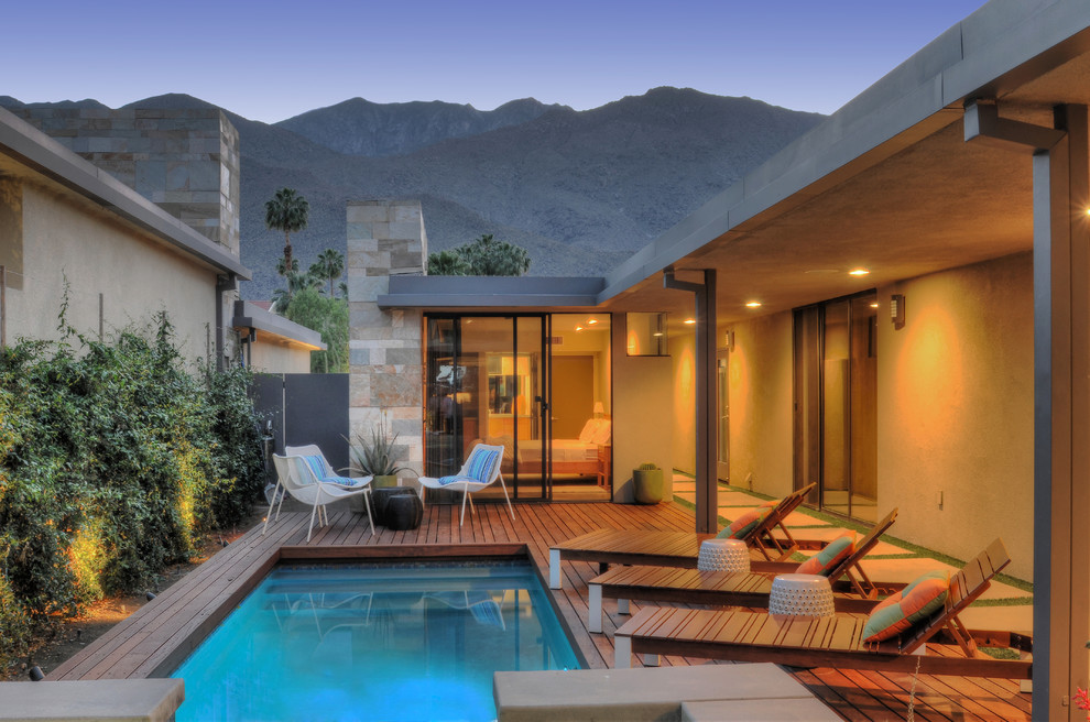 Design ideas for a contemporary swimming pool in Los Angeles with decking.
