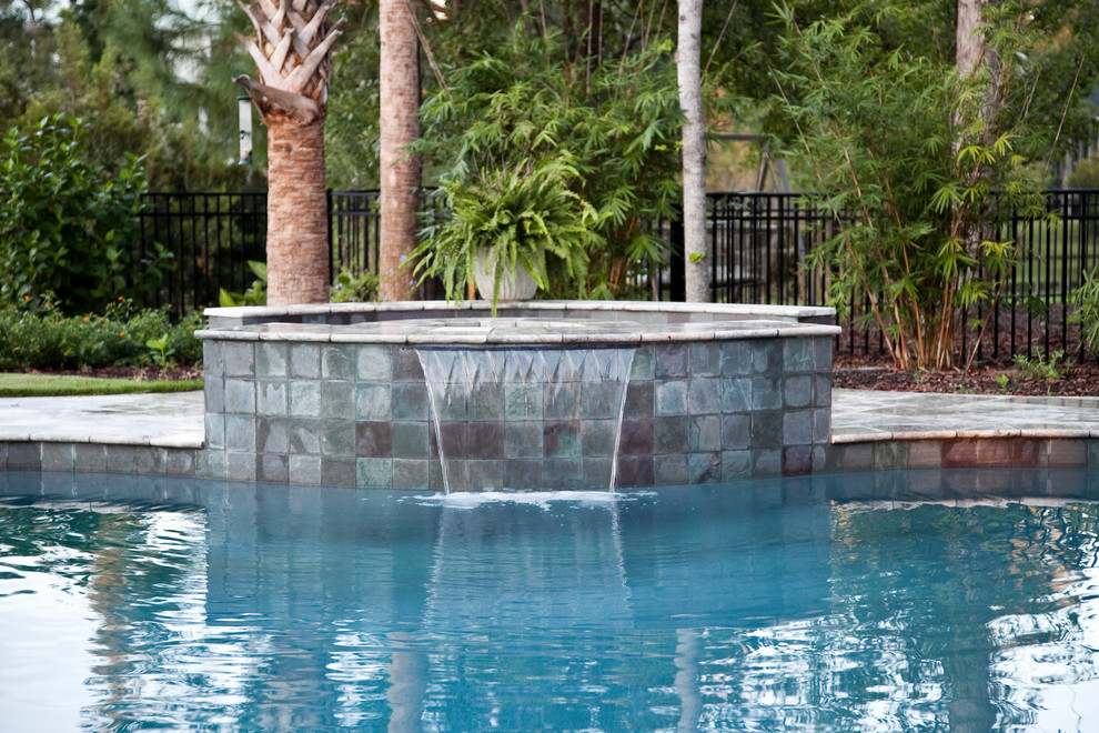 Inspiration for a large timeless backyard custom-shaped hot tub remodel in Charleston