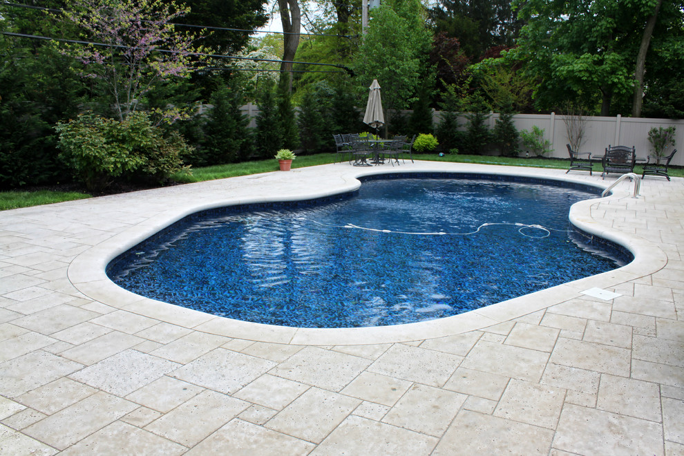 Example of an arts and crafts pool design in New York