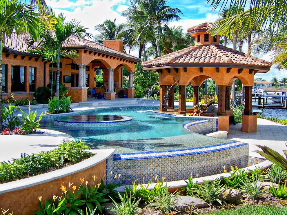 Example of an island style infinity pool design in Miami