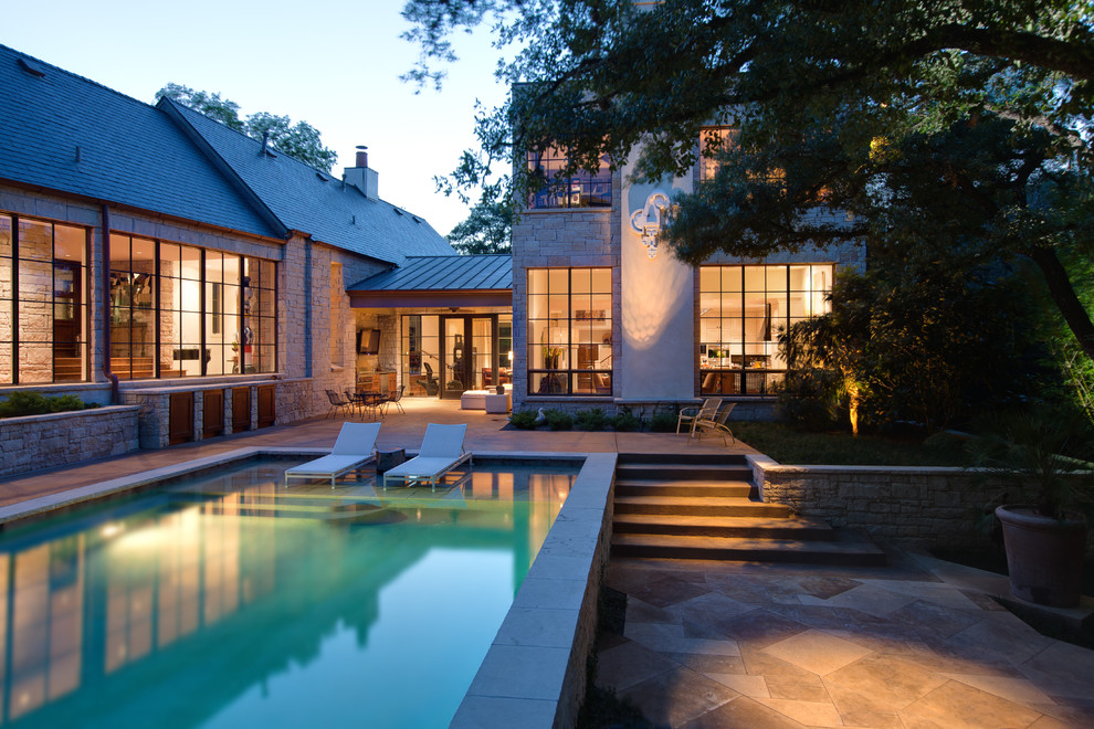 Design ideas for a traditional rectangular swimming pool in Austin.