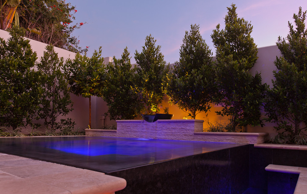 Perimeter overflow infinity spa granite and travertine