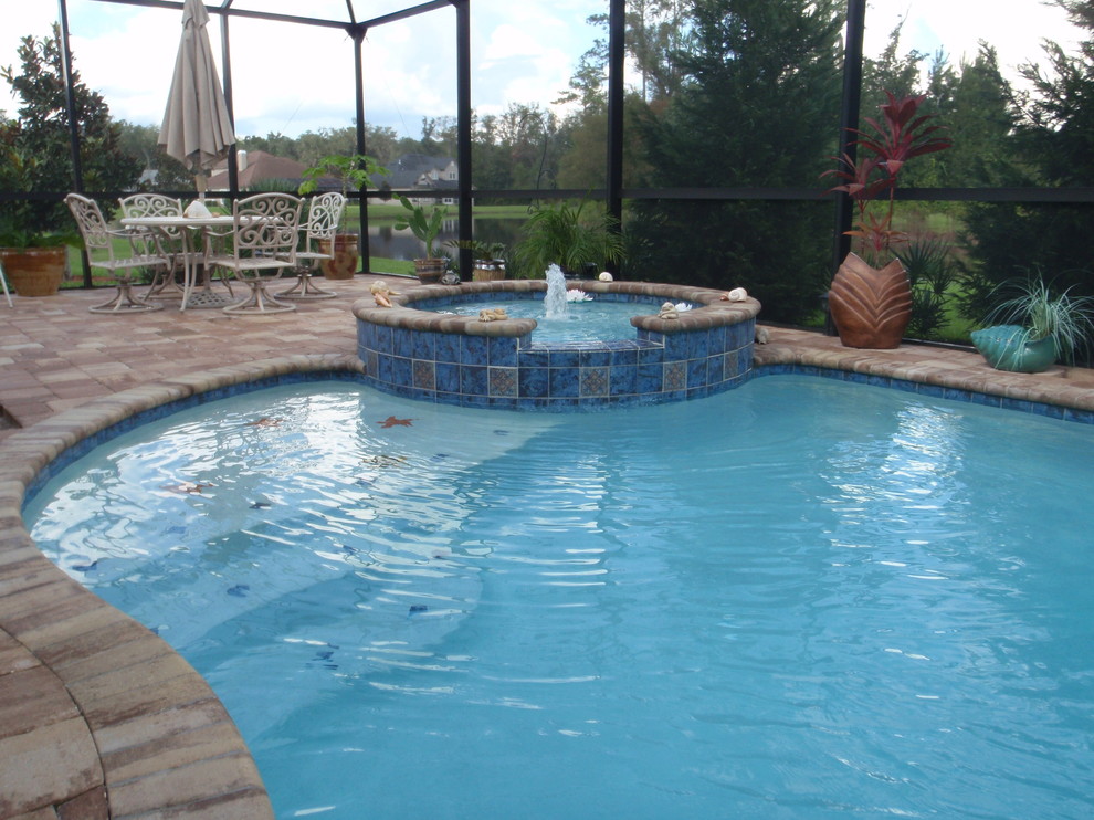 Design ideas for a contemporary swimming pool in Jacksonville.