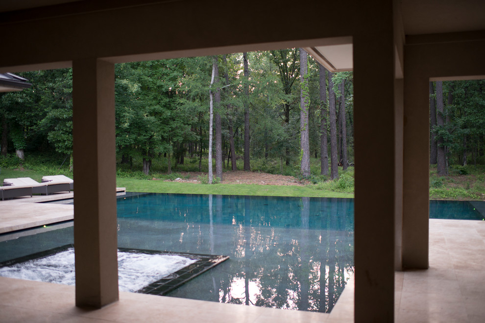 Design ideas for a contemporary swimming pool in Little Rock.