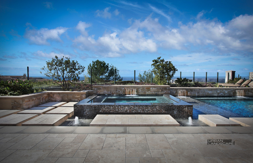 Photo of a modern swimming pool in Orange County.