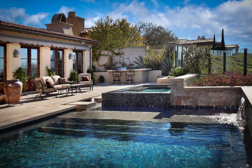 Design ideas for a classic swimming pool in Orange County.