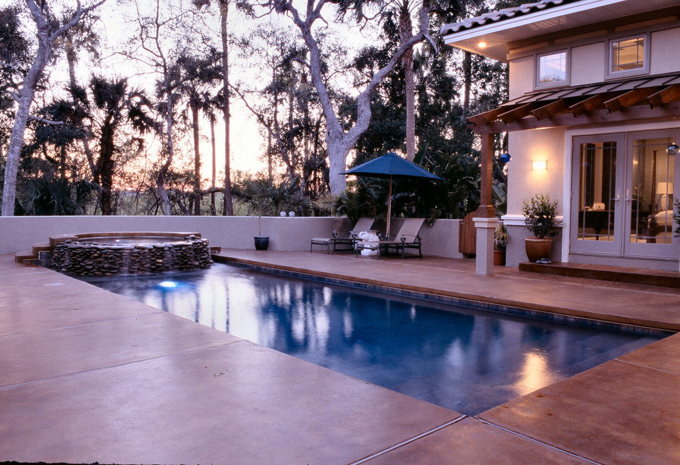 This is an example of a medium sized mediterranean back rectangular lengths hot tub in Jacksonville.
