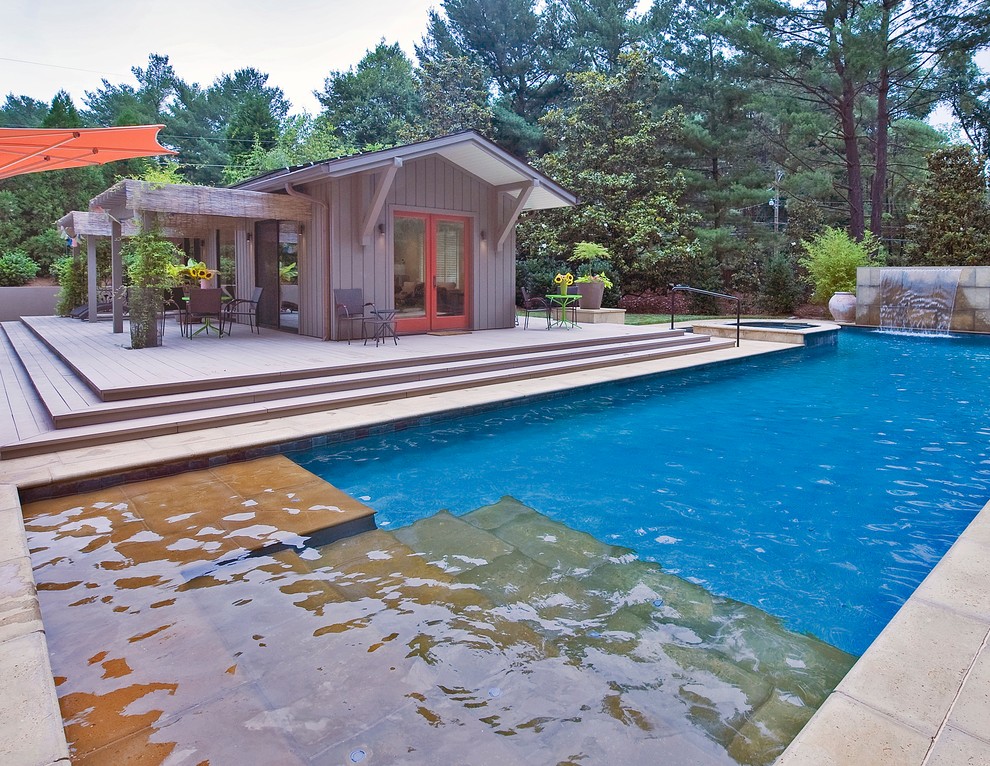Esempio di una piscina stile rurale