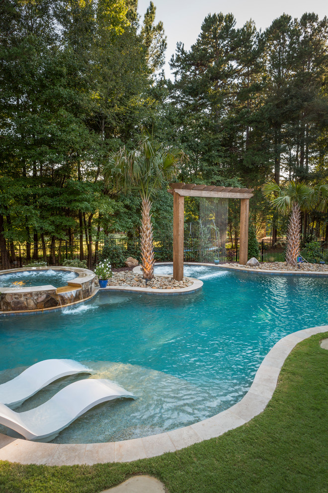 Photo of a traditional swimming pool in Charlotte.