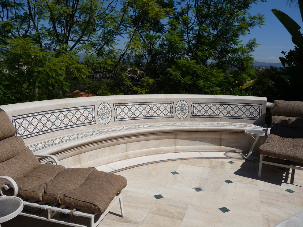 Pool - mid-sized eclectic backyard tile pool idea in Orange County
