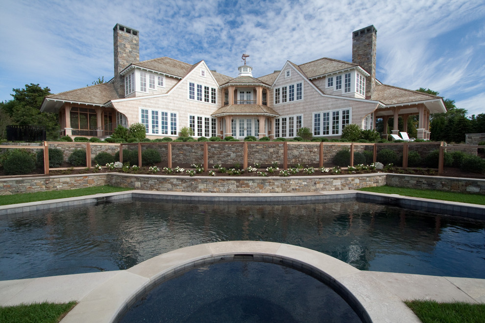 Pool and spa Beach Style Pool Boston by The Schumacher