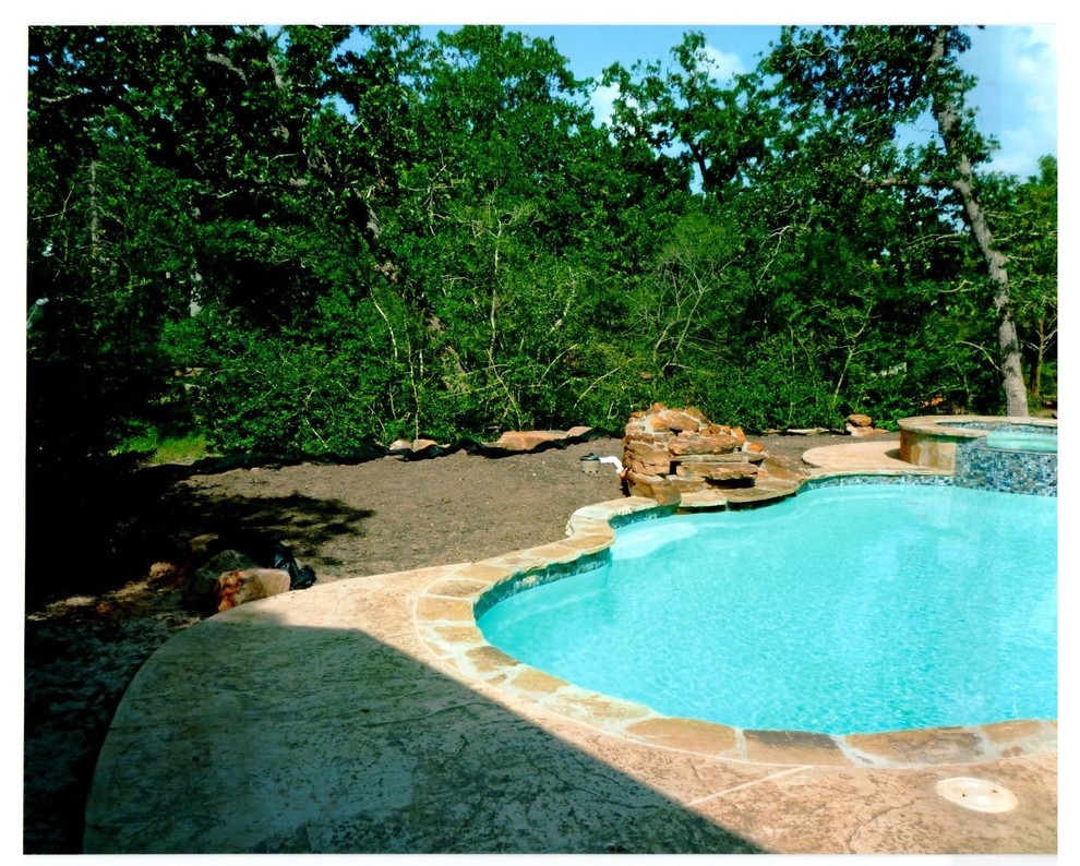 Inspiration for a medium sized world-inspired swimming pool in Austin.
