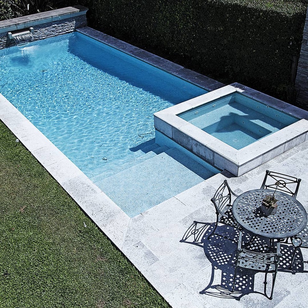 Photo of a large modern back rectangular lengths swimming pool in San Francisco.