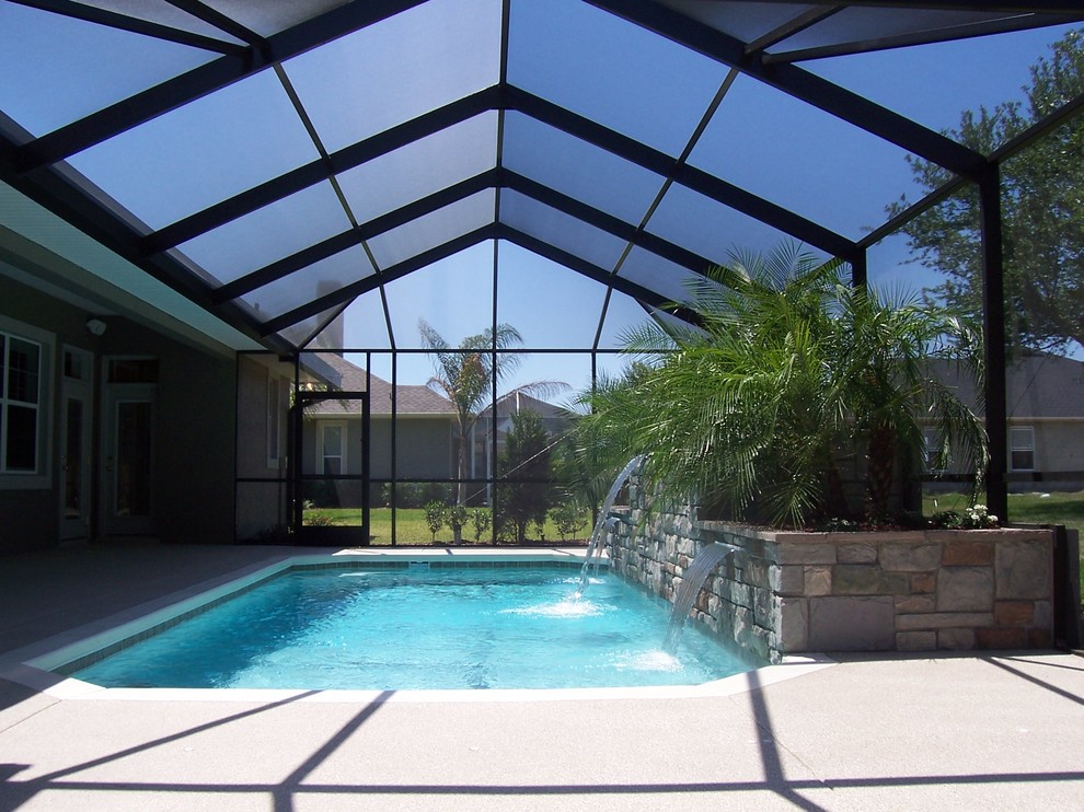 Inspiration for a contemporary pool remodel in Tampa