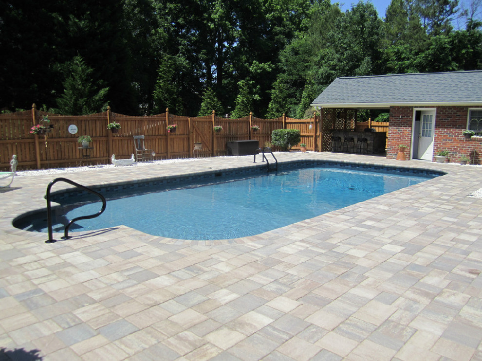 This is an example of a contemporary swimming pool in Charlotte.