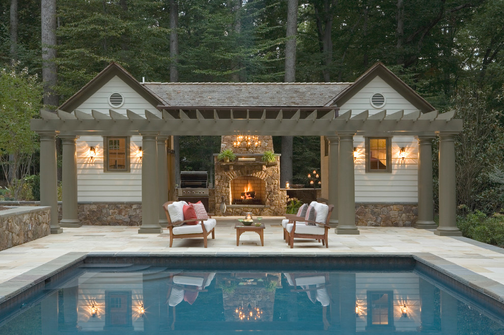 Photo of a classic rectangular swimming pool in DC Metro with a bbq area.