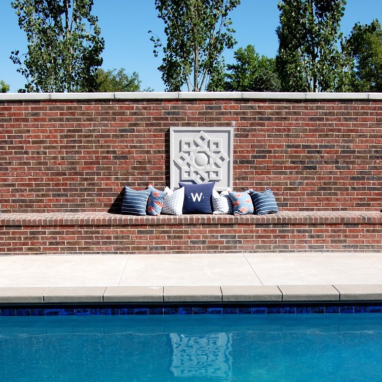 Mid-sized transitional backyard rectangular pool house photo in Salt Lake City