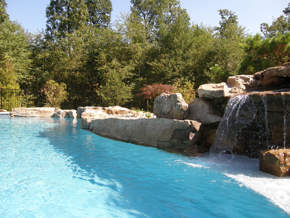 Example of a mountain style pool design in Other