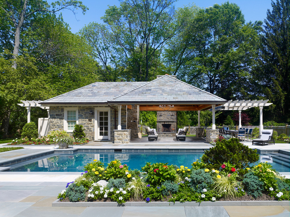 Example of a classic pool house design in Philadelphia