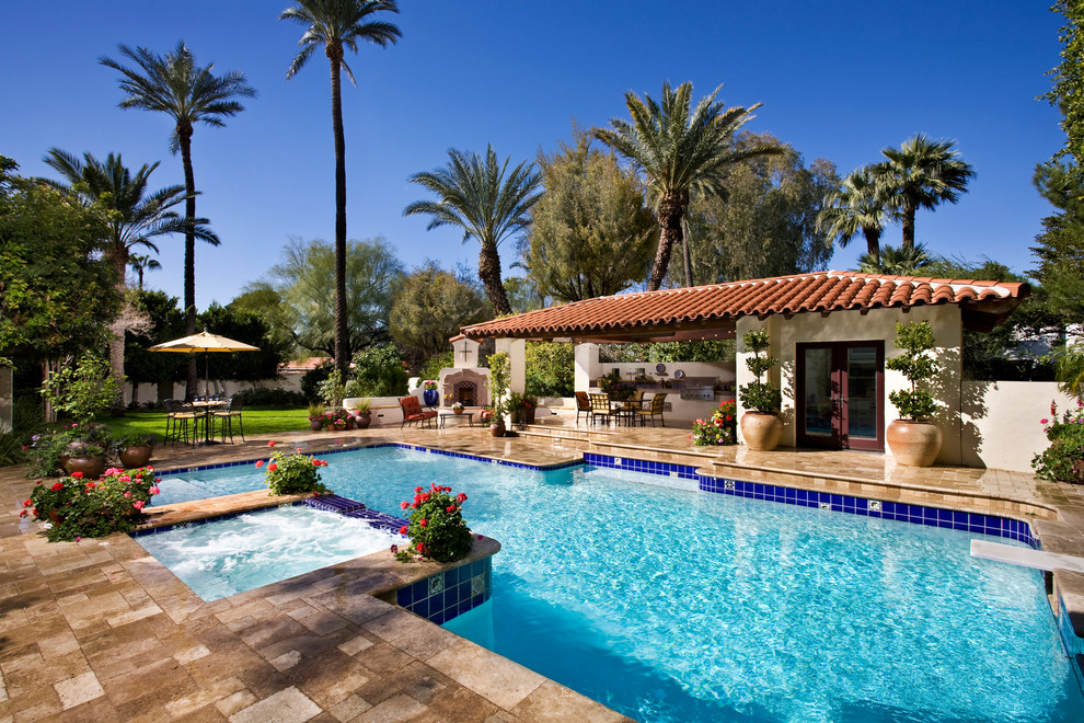 Inspiration for a mid-sized mediterranean backyard custom-shaped pool remodel in Phoenix