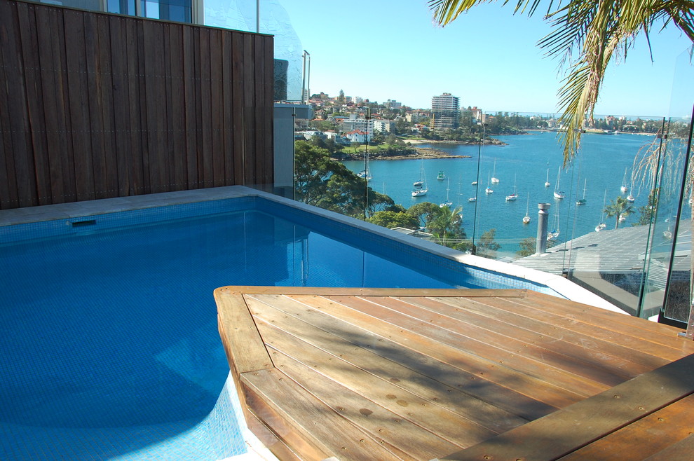 Mittelgroßer Moderner Pool hinter dem Haus in Nierenform mit Natursteinplatten in Sydney