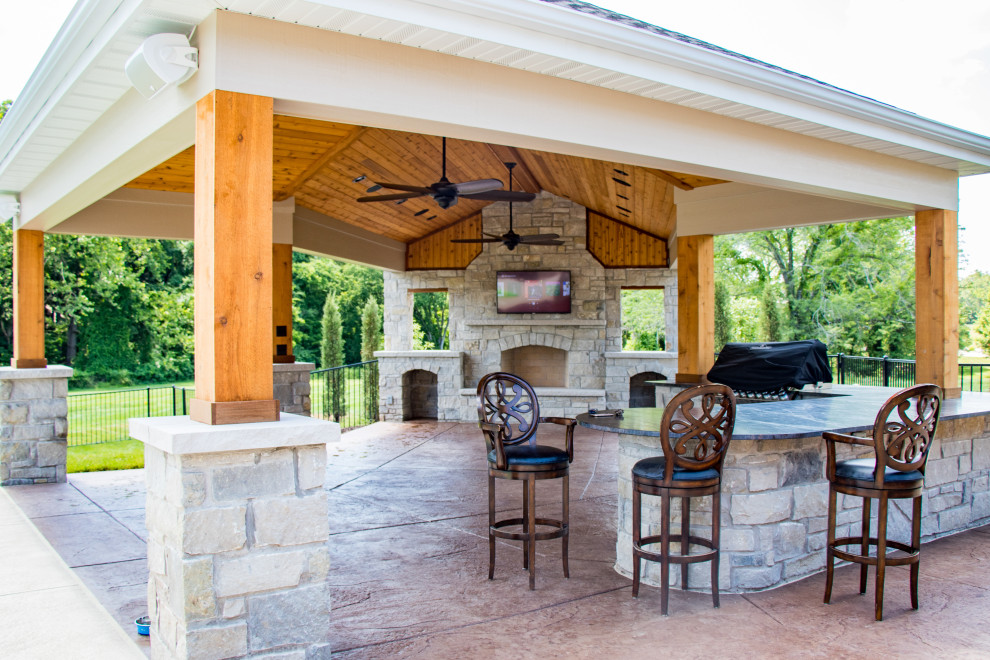 PoolSide Outdoor Room with Grilling & Bar Area and Fireplace Patio St Louis by Heartlands