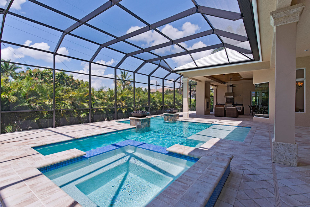Pool - tropical backyard custom-shaped lap pool idea in Miami
