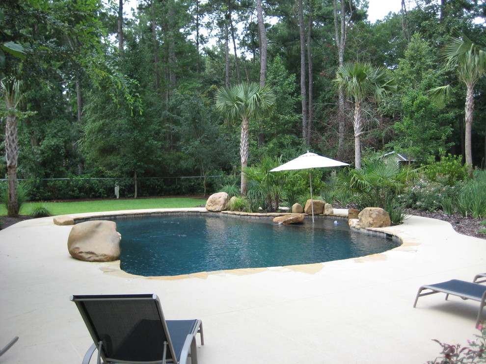 Island style pool photo in Atlanta