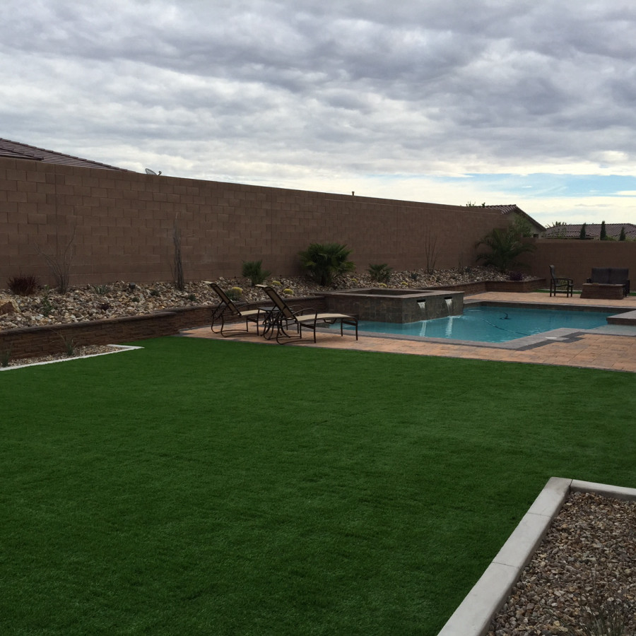Mittelgroßer Klassischer Pool hinter dem Haus in individueller Form mit Betonboden in Las Vegas