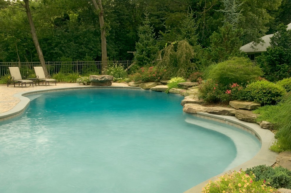 Mountain style pool photo in New York
