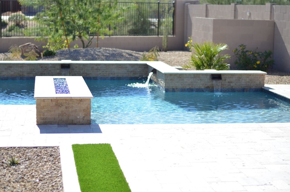 Trendy backyard custom-shaped pool fountain photo in Phoenix
