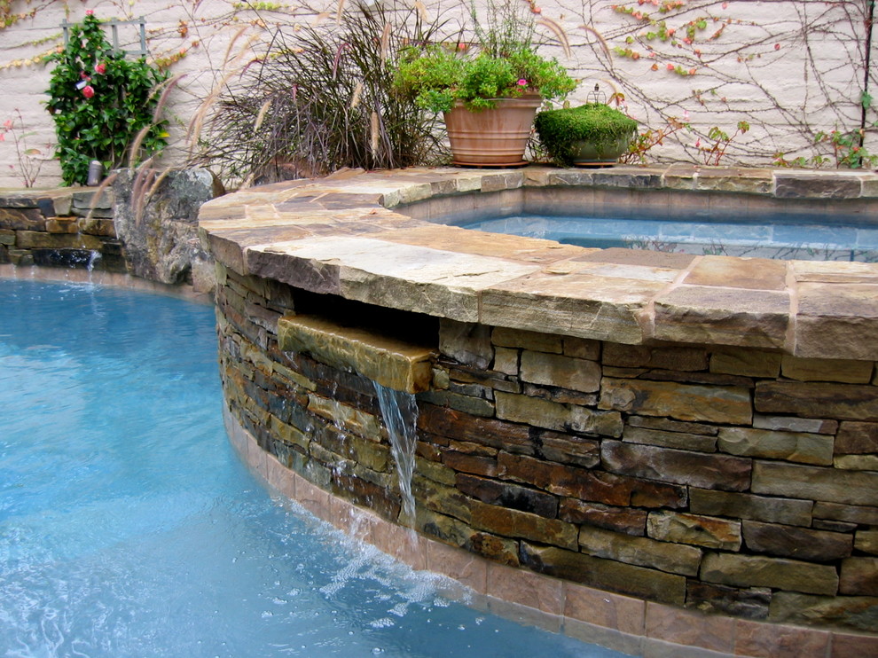 Design ideas for a traditional swimming pool in Orange County.
