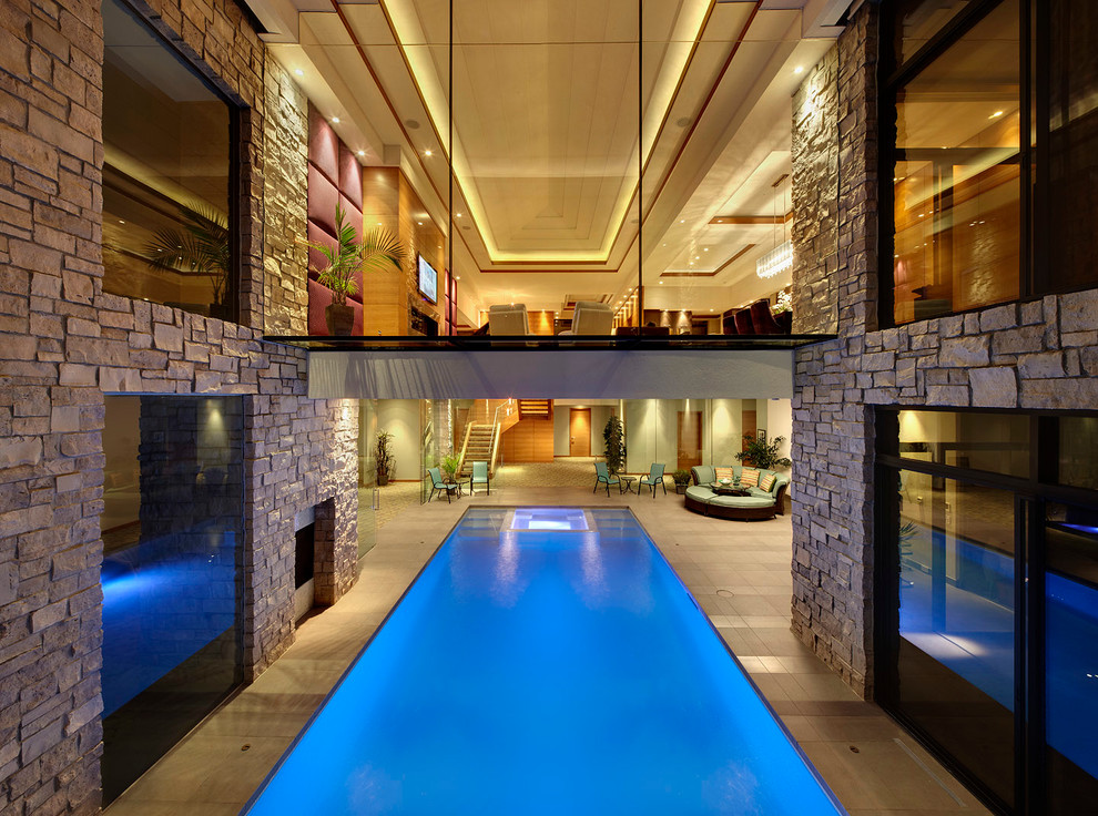 Photo of a contemporary courtyard rectangular swimming pool in Detroit.