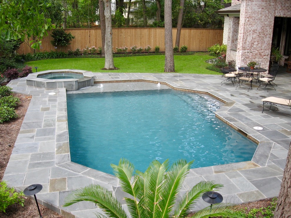 Inspiration for a medium sized traditional back rectangular lengths hot tub in Houston with tiled flooring.