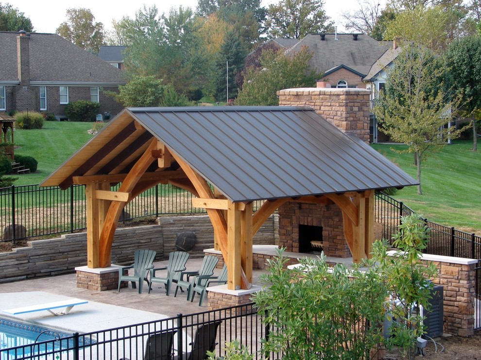 Example of an arts and crafts pool house design in Cincinnati