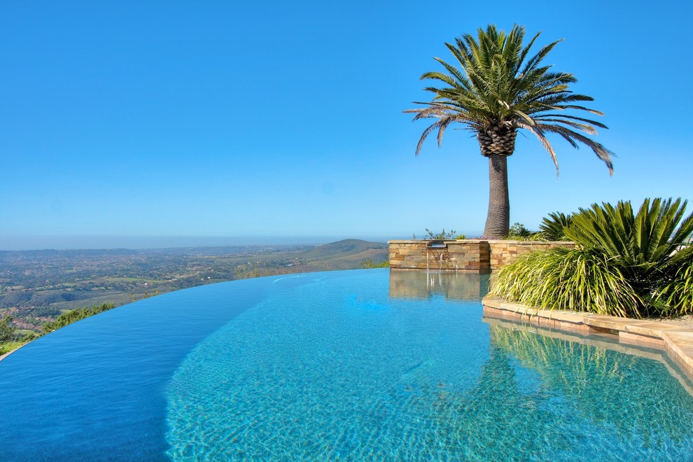 Design ideas for a mediterranean infinity swimming pool in Orange County.