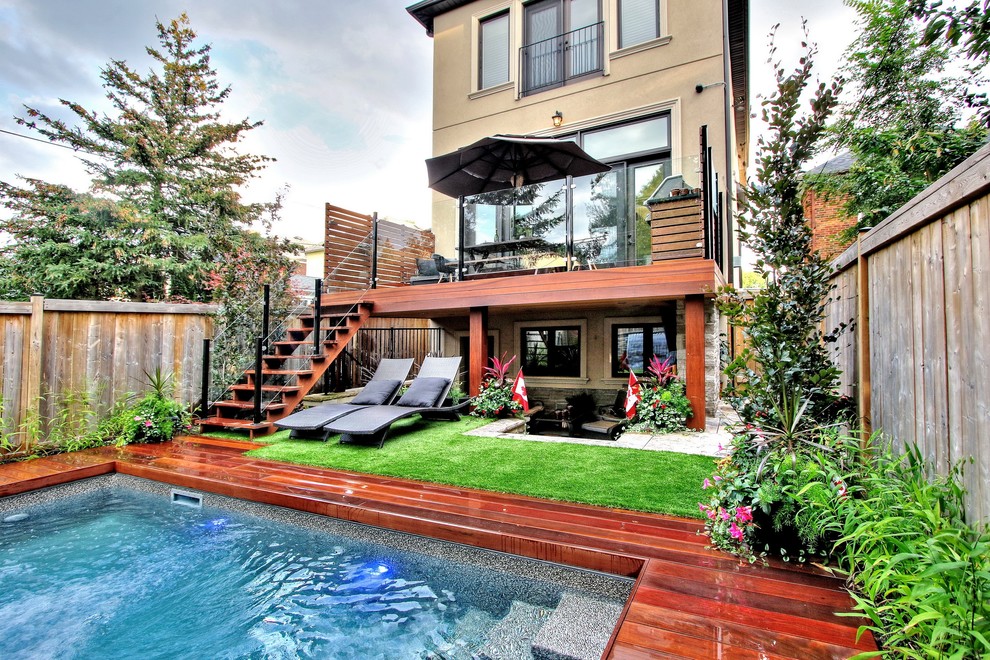 Postage Stamp Yard Loaded with Features Transitional Pool Toronto