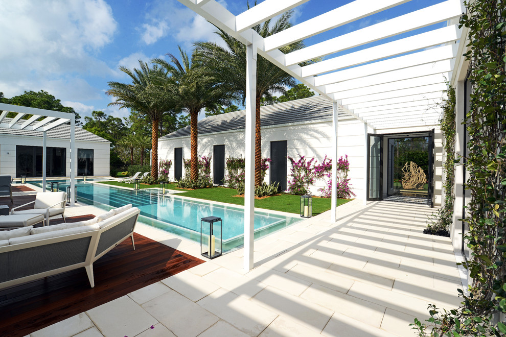 Contemporary rectangular lengths swimming pool in Miami.