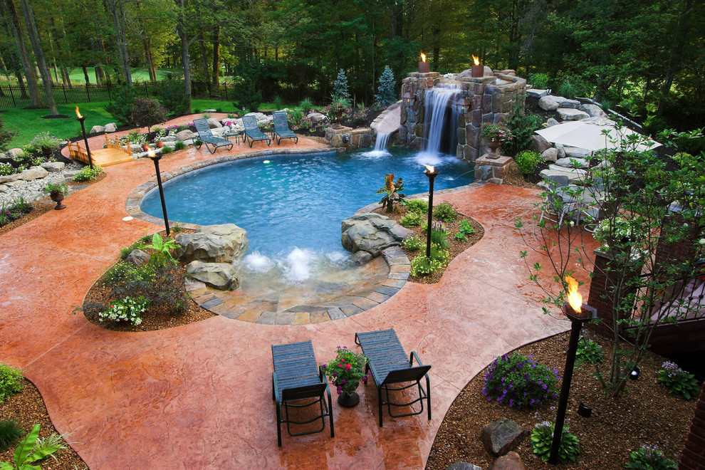 Example of an island style custom-shaped natural pool design in Cincinnati