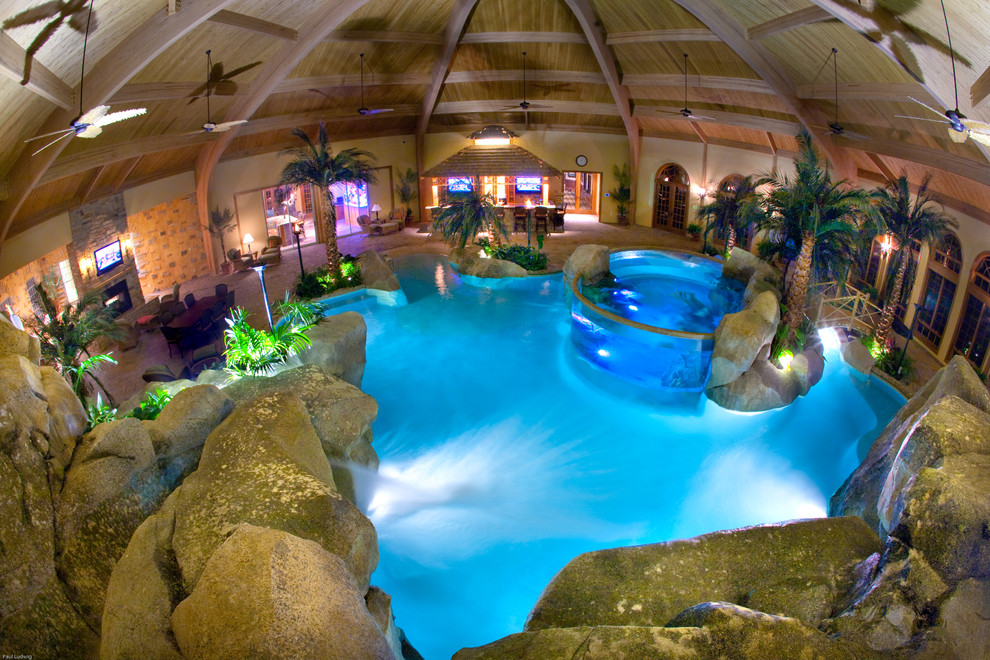 Island style pool photo in Cincinnati